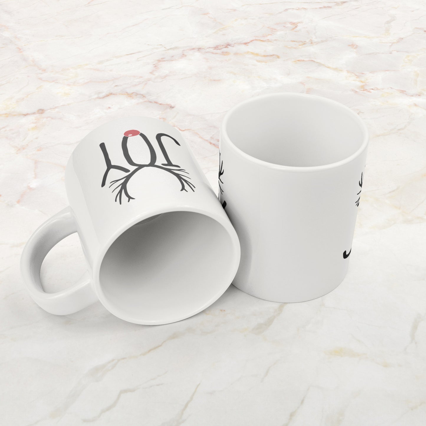 Two Joyful Reindeer Antlers Mugs on marble surface