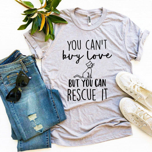 Light gray T-shirt with 'You Can't Buy Love But You Can Rescue It' text