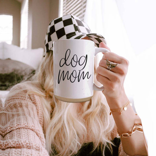 Woman holding Dog Mom coffee mug