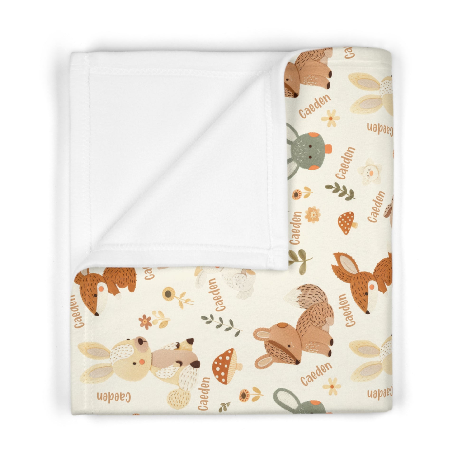 Folded personalized woodland animals baby blanket