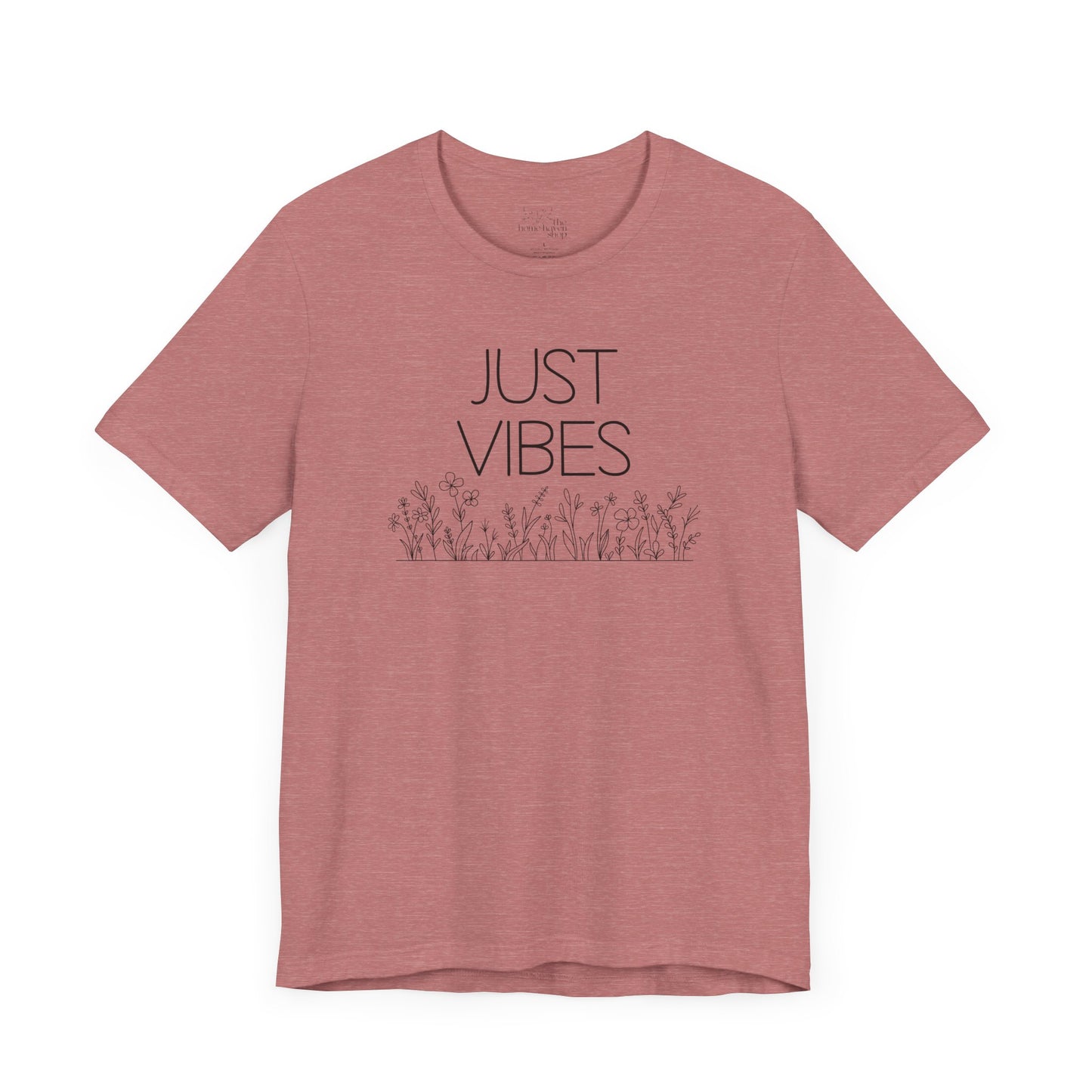 Just Vibes Graphic T-Shirt in dusty rose with minimalist floral design laid flat against a plain white background.