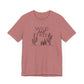 Rust-colored Wild and Free cactus graphic T-shirt displayed flat, showcasing a relaxed fit and minimalist boho design.