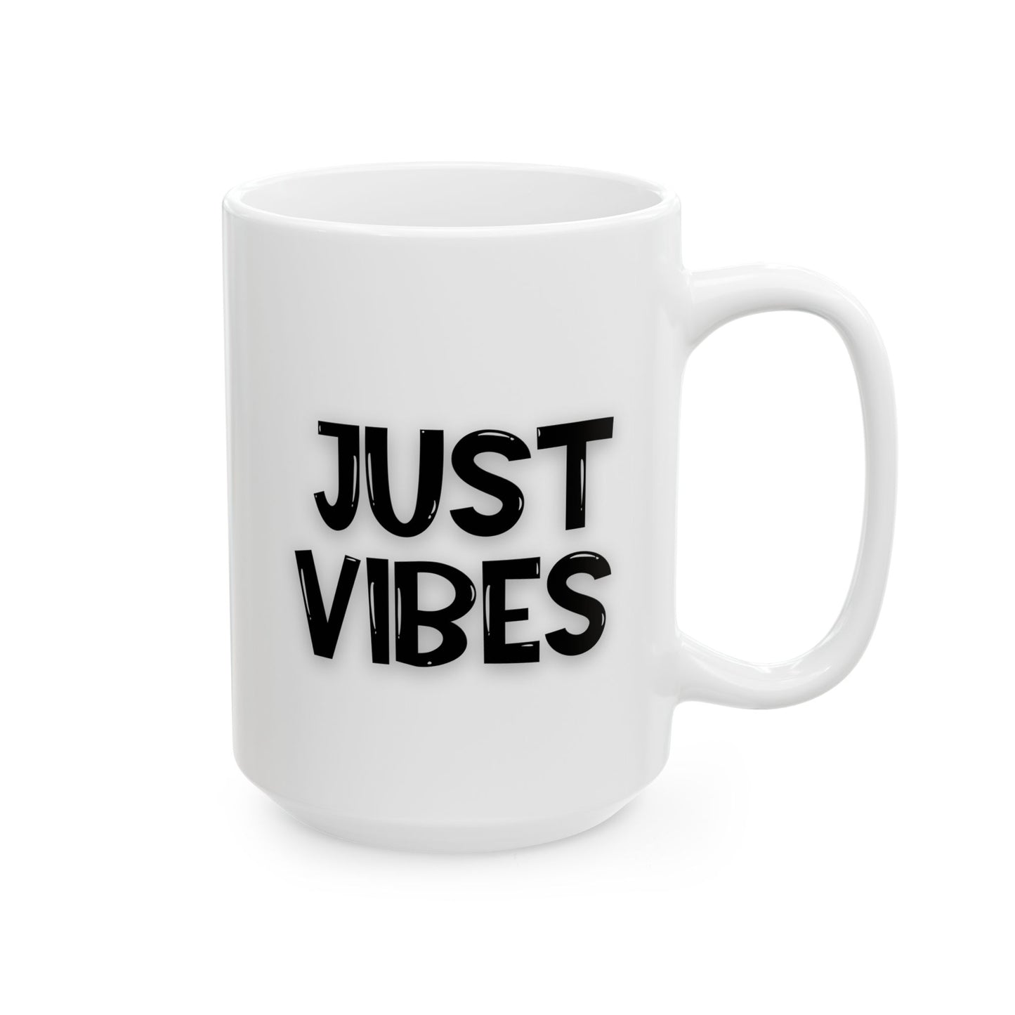 Angled view of a white ceramic mug with 'Just Vibes' text in black, highlighting its large capacity and ergonomic handle.