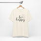 Cream Be Happy graphic t-shirt with minimalist butterfly design hanging on a wooden hanger, perfect for casual and chic outfits.
