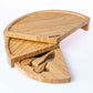 Bamboo cheese board with knife storage open.