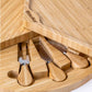 Close-up of bamboo cheese board knife set.
