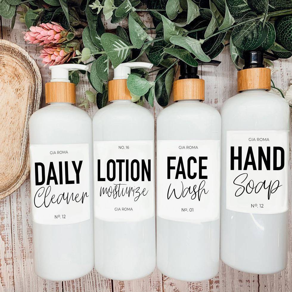 Set of 16oz white PET pump bottles labeled daily cleaner, lotion, face wash, and hand soap. Stylish dispensers with floral and greenery decor.