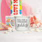 14.5oz ceramic coffee mug with 'You Are a Freaking Goddess' design, surrounded by candy and Valentine's Day decorations.